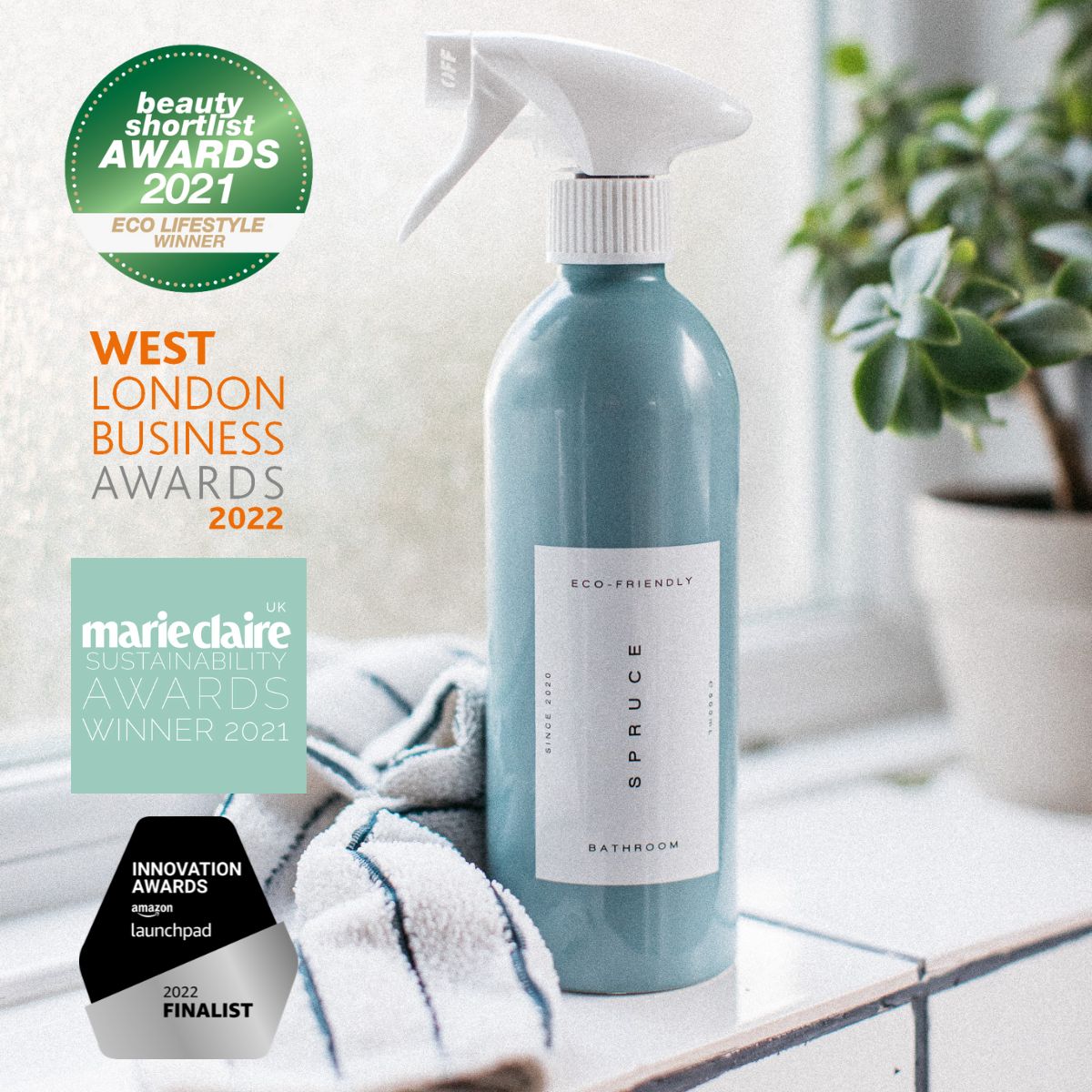 A daily shower cleaner in a bathroom with award logos