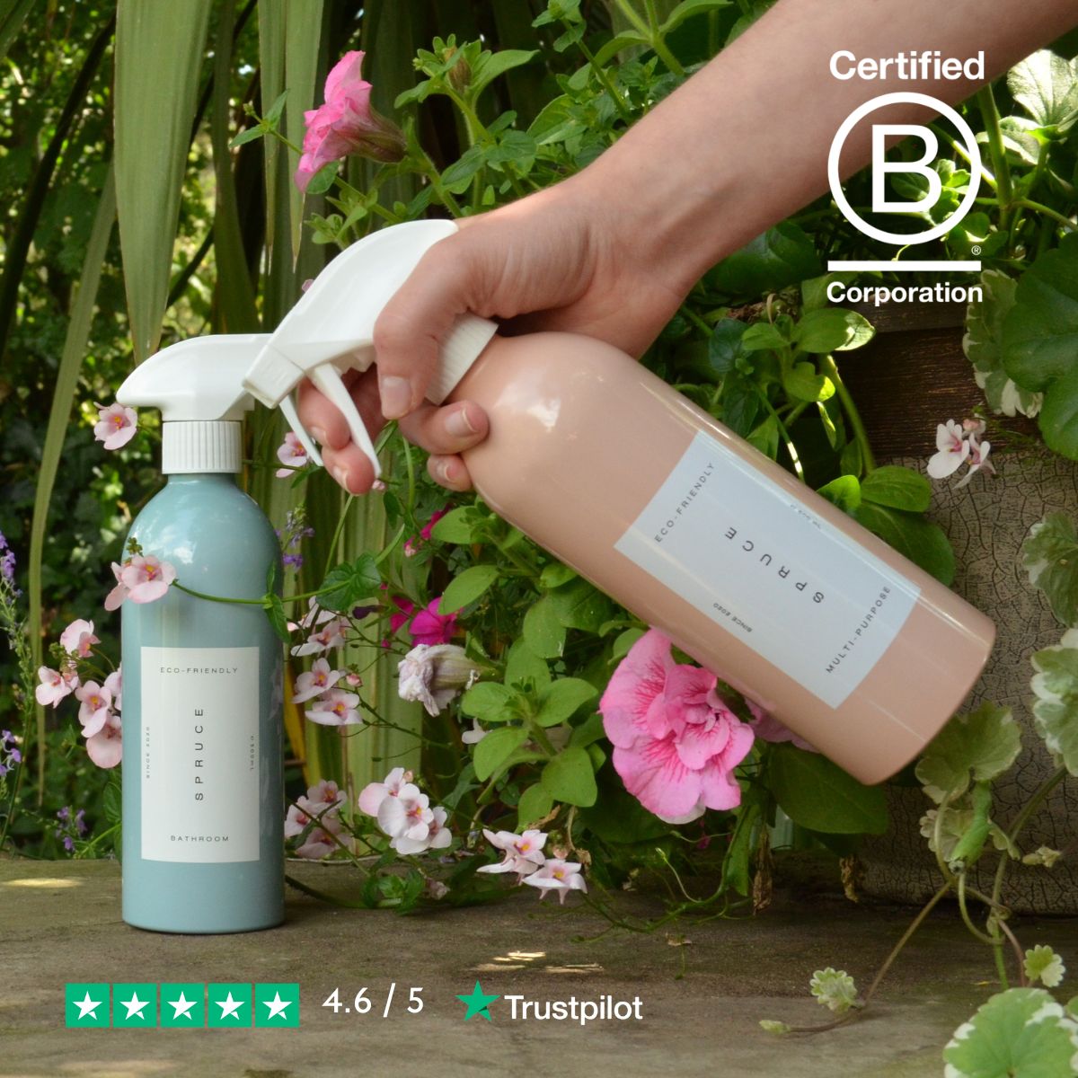 Hand spraying natural cleaning products outside