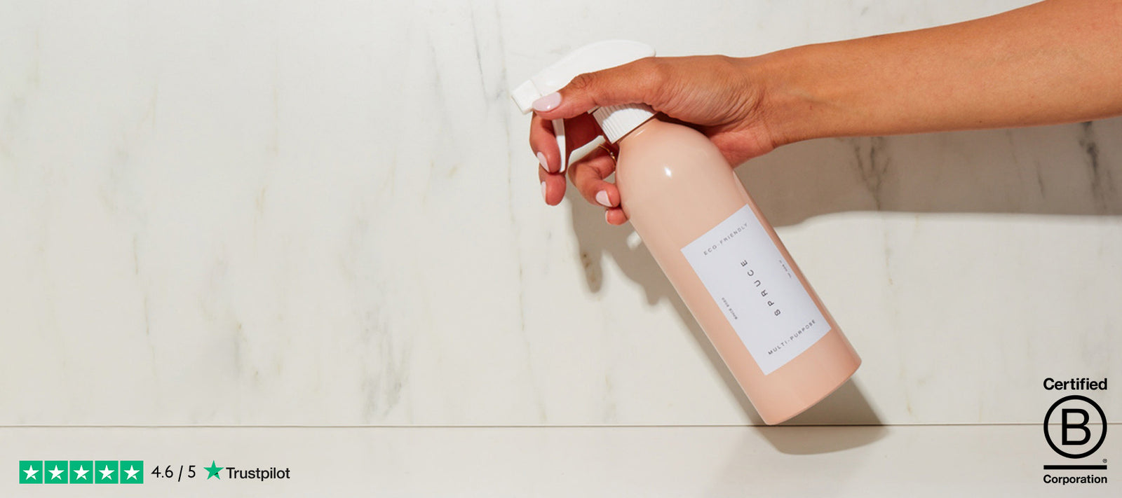 a hand spraying surface cleaner