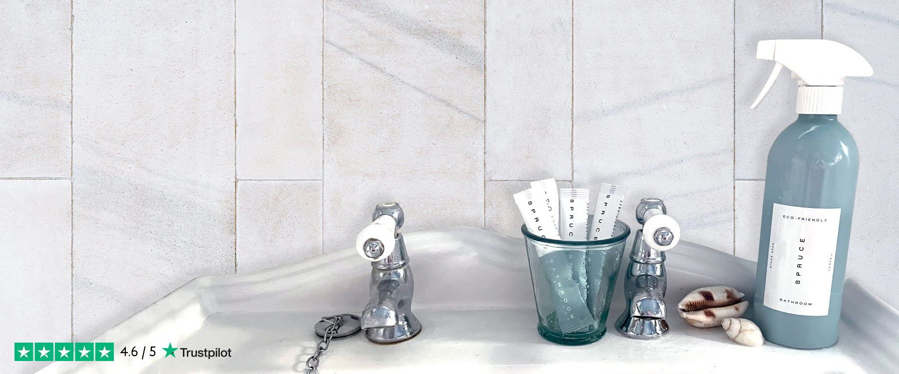 a tile cleaner and refills on bathroom sink